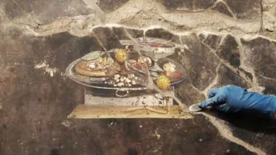 Italia: hallaron pintura de 2.000 años que tendría a una pizza dibujada entre sus elementos